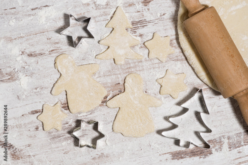 dough for baking Christmas cookies on wooden table, closeup dough for baking Christmas cookies on wooden table, closeup