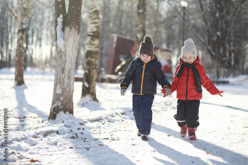Children in winter park play