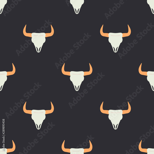 Vector seamless color pattern with simplified buffalo, bison skull. Wild west symbolic textile ornament. Background indian folkloric decoration. Festive texture authentic, ethnic wrapping gift paper.