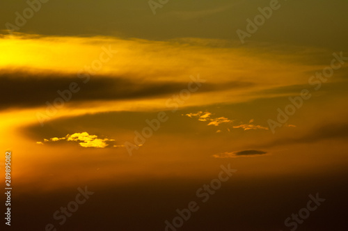 clouds silhouette on sunset background