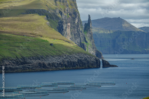 Faroe Islands, Sandavagur long shot with fish farms, Witch's Finger photo