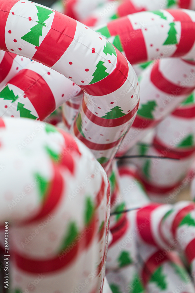 Inflatable Plastic Candy Canes On Display At Outdoor Christmas Festival