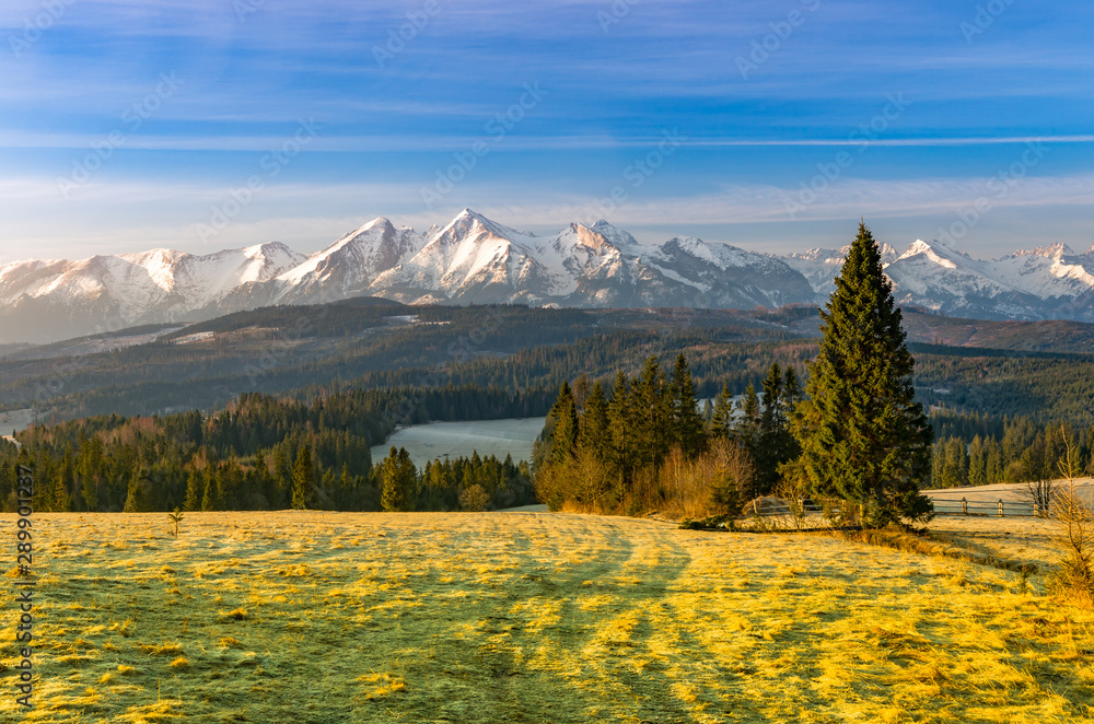 Beautiful spring panorama over Spisz highland to snowy Tatra mountains in the morning, Poland