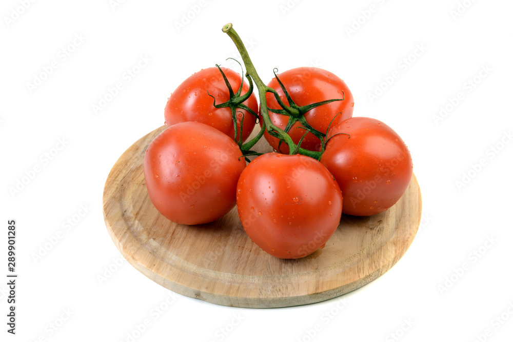 tomatoes on kitchen board isolated tomatoes on kitchen board isolated