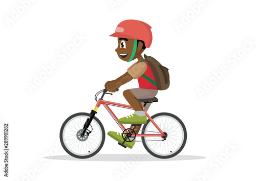 Fototapeta Naklejka Na Ścianę i Meble -  Teen kid school African boy cycling on bicycle.