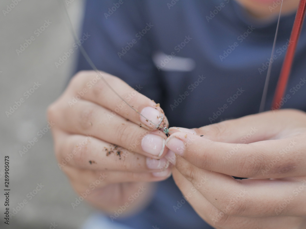 Young Boy Put a Worm on a Hook, Worm Fishing Young Boy Put a Worm on a Hook, Worm Fishing