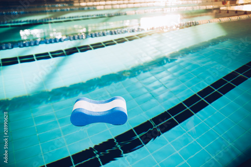 Pull buoy over the water abandoned in the swimming pool or marking pyramids by children