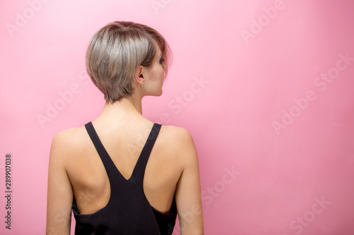 Принти на полотні Fashion beautiful young woman with short hair over pink background