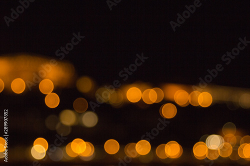 blurry lights of a big city at night. Background for travel photos. bokeh advertising poster