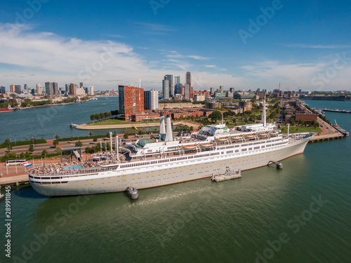Obraz na plátně aerial of SS Rotterdam ship moared on Katendrecht land head with skyline of towe