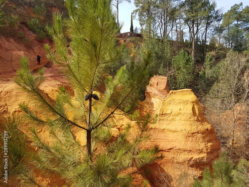 Provence is the southern region of France. Natural Geology Park in Roussillon. Remains of a mining ocher quarry. Famous tourist spot of the European continent. Martian landscape of orange cliffs