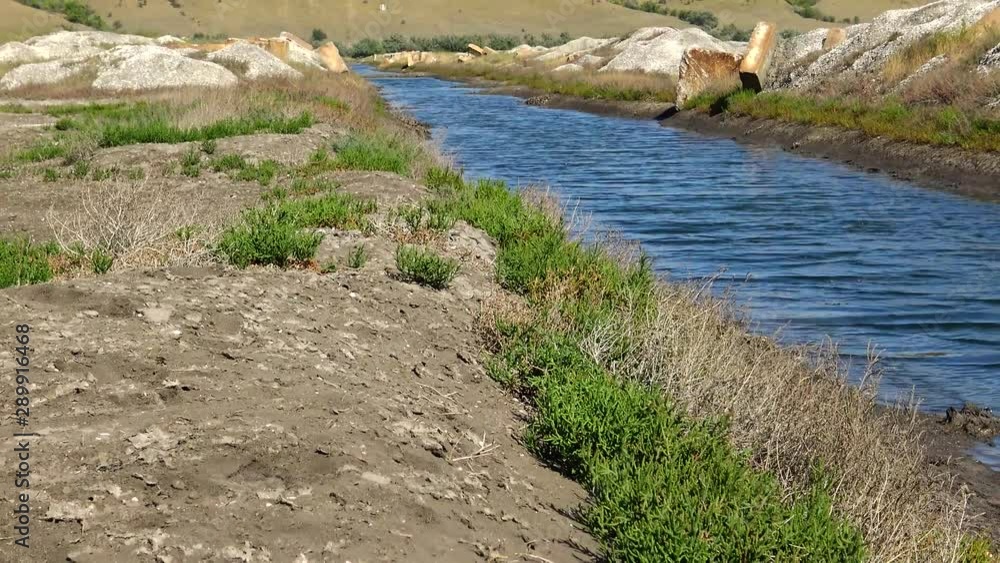 An artificial canal blocking the path of the small river Big Kuyalnik in the Kuyalnik estuary, Ukraine. An artificial canal blocking the path of the small river Big Kuyalnik in the Kuyalnik estuary, Ukraine.
