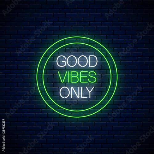 Good vibes only - glowing neon inscription phrase in green circle frame. Motivation quote in neon style.