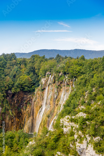 Beautiful view of the most famous waterfalls in the sunshine in Plitvice National Park  Croatia