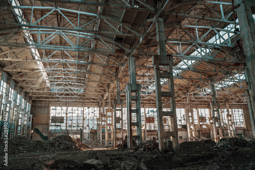 Ruined industrial hall of warehouse or hangar in process of reconstruction