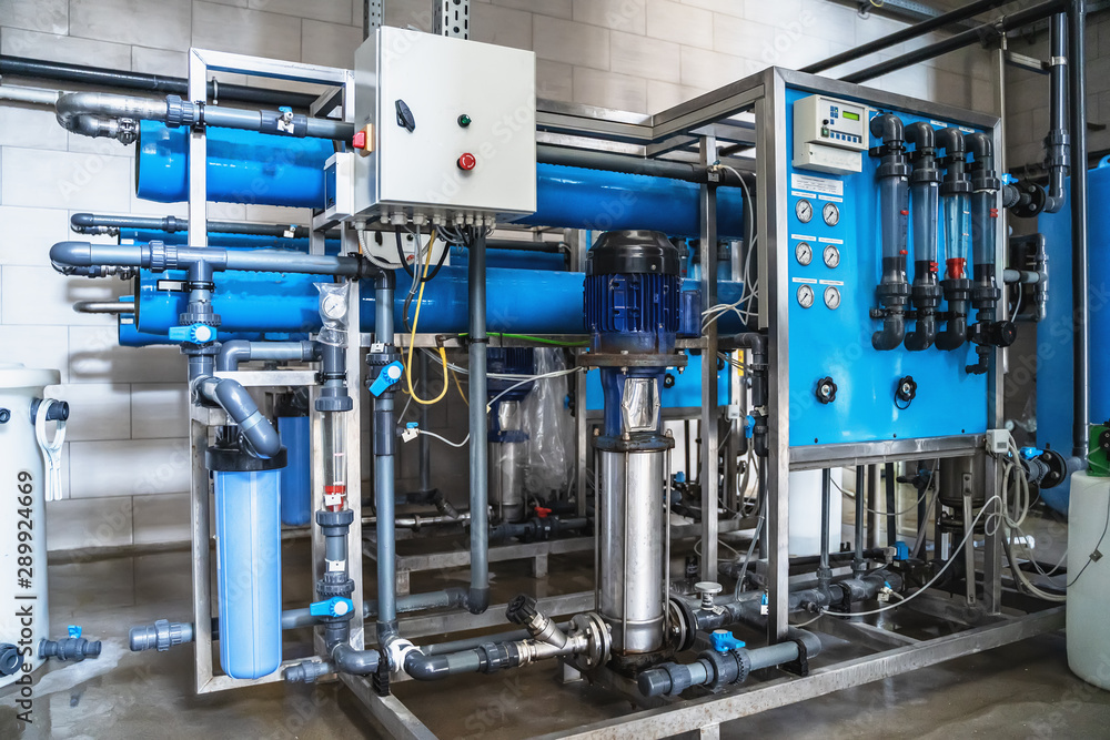 System of automatic treatment and multi-level filtration of drinking water produced from well. Plant or factory for production of purified drinking water System of automatic treatment and multi-level filtration of drinking water produced from well. Plant or factory for production of purified drinking water
