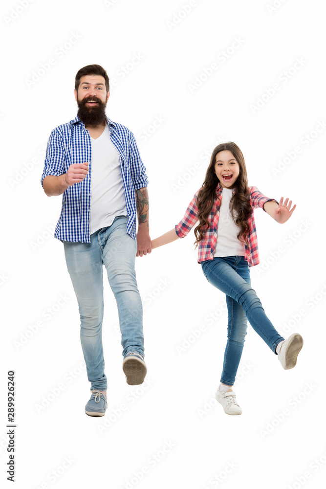 Following fathers example. On same wave concept. Bearded father and small child walking or running together. Move on. Lets move. Kid and dad cheerful friends in motion. Move in same direction