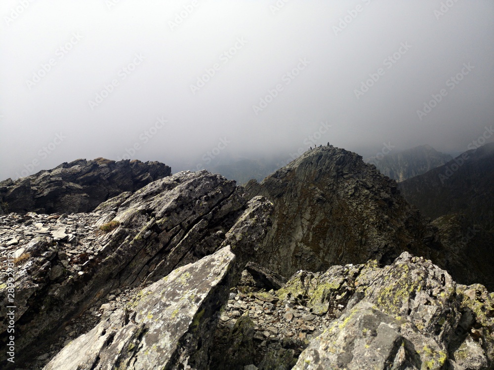 Landscape in the mountains  with stormy clouds above.  Fagaras - Lespezi and Coltu Caltunului Peaks