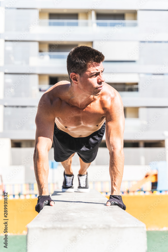 Obraz premium Young Man Training Outdoors.