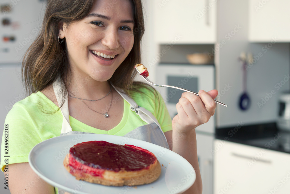 woman cake pizza in kitchen