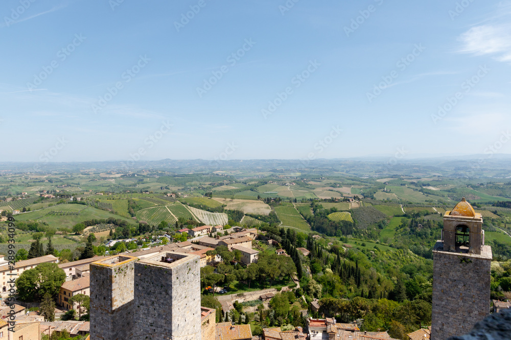 Wide angle view of San Gimignano, a small walled medieval hill town in the province of Siena, Tuscany, north-central Italy, taken from the top of one of the towers