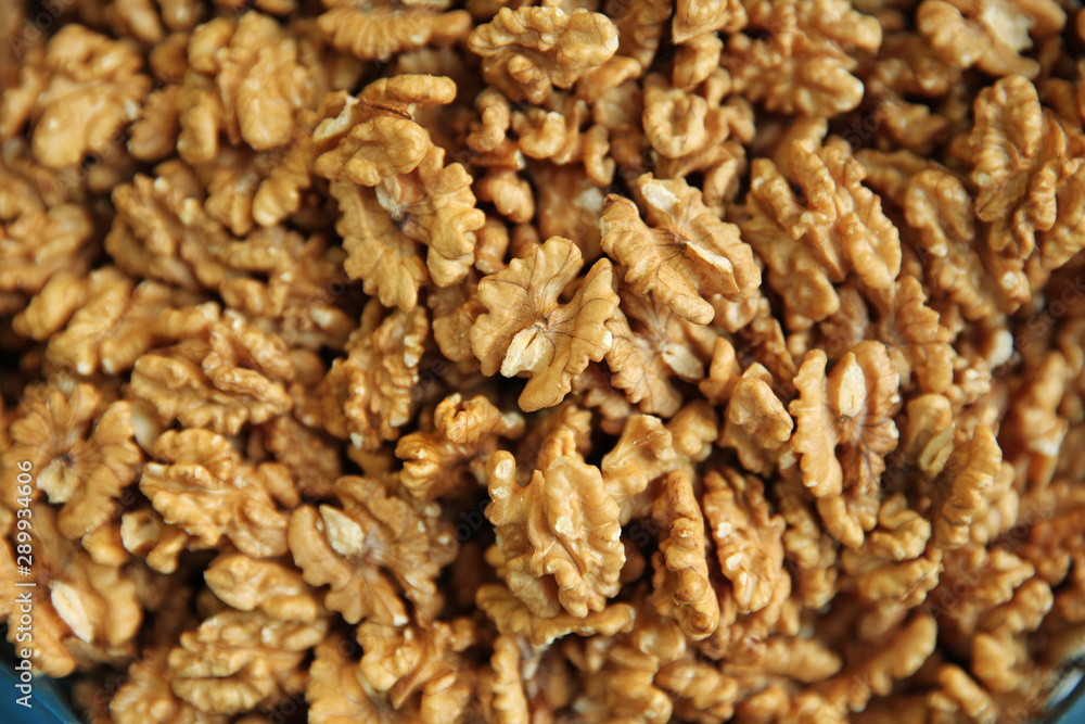 Walnut. Background of a large number of new crop nuts Walnut. Background of a large number of new crop nuts