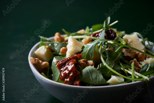 rocket salad with dry toamto photo