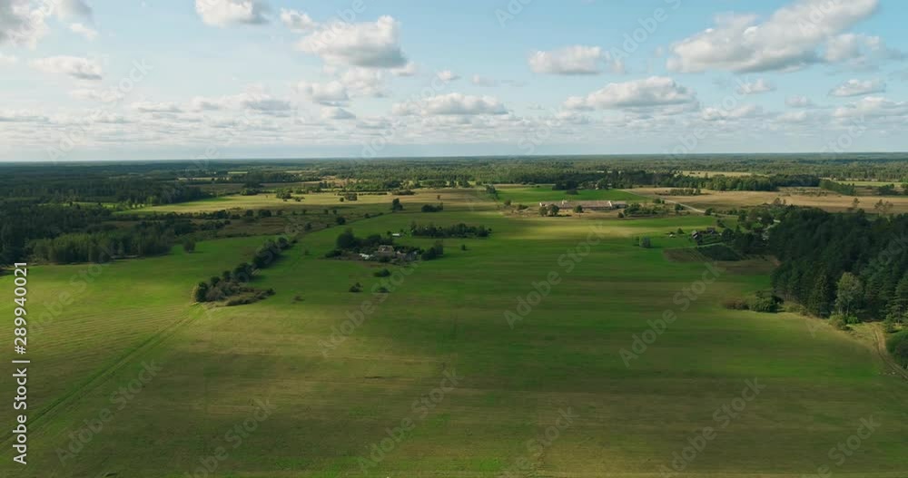Aerial Flight Over summer forest and fields at sunset. Aerial footage. Amazing Lighting. Aerial Flight Over summer forest and fields at sunset. Aerial footage. Amazing Lighting.