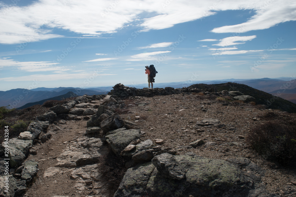 Hiker on pemigewasset trail, White Mountains New Hampshire