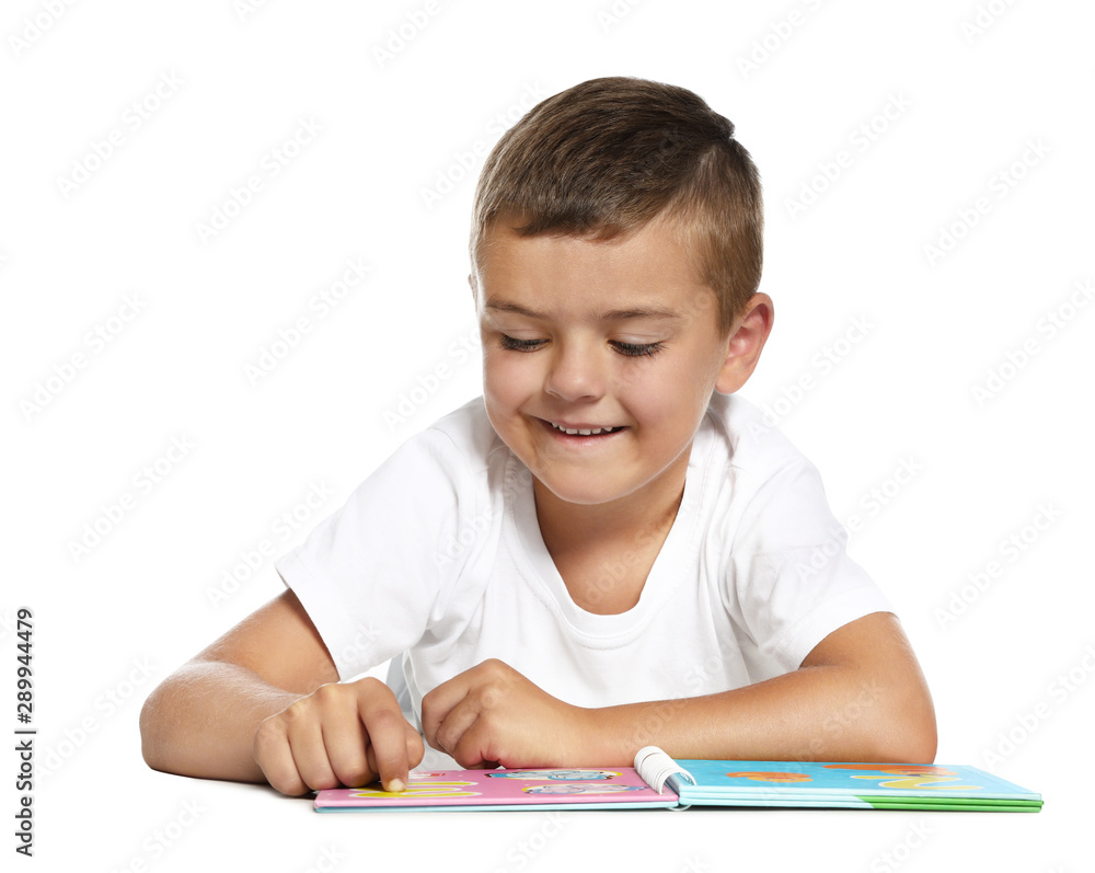 Cute little boy reading book on white background Cute little boy reading book on white background