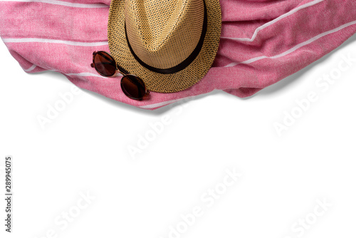 Hat, towel and sunglasses. Top view. Summer holiday concept element. Isolated on white background.