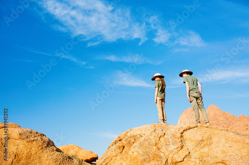 Kids hiking in Spitzkoppe Namibia