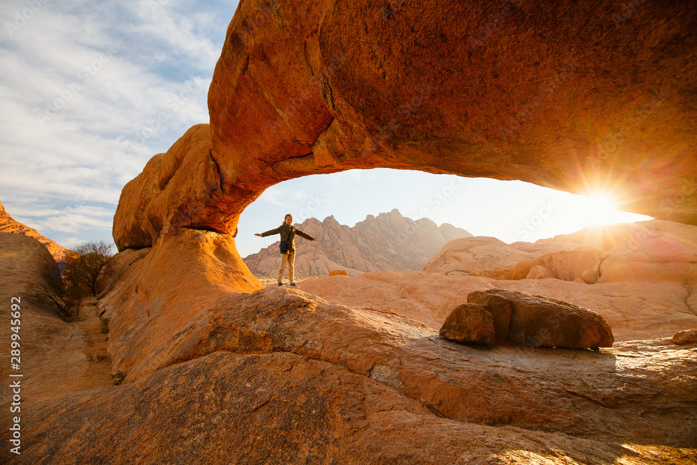 Young girl hiking in Spitzkoppe Namibia