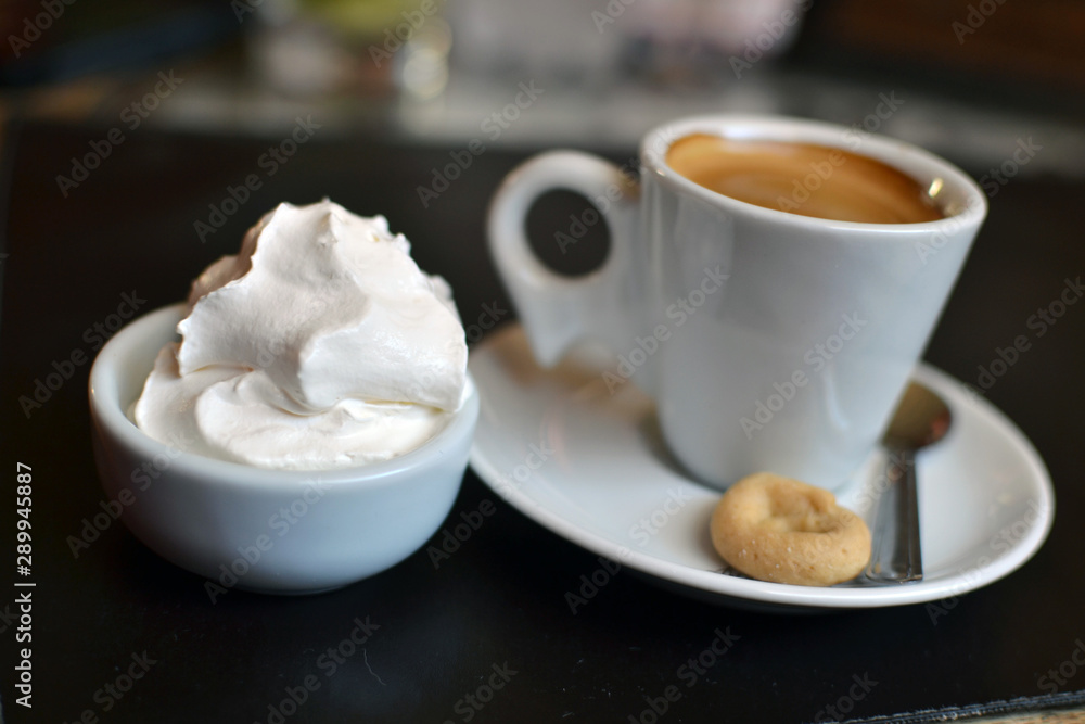 coffee with chantilly cream closeup coffee with chantilly cream closeup