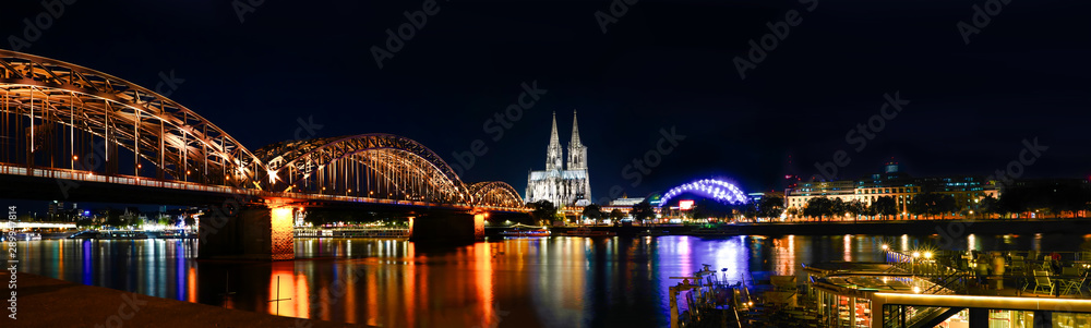 Panorama Cologne Cathedral and Hohenzollern Bridge at night , Cologne, Germany