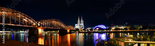 Panorama Cologne Cathedral and Hohenzollern Bridge at night , Cologne, Germany