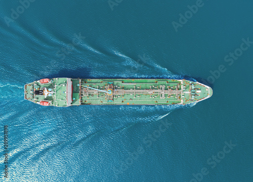 Aerial top view Oil ship tanker carrier oil from refinery on the sea. © Pawinee