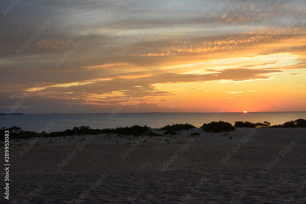 Sunset over the sound as seen from the top of the sand dunes in Jockeys Ridge State Park on the Outer Banks