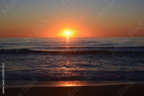 Sunrise over the Atlantic ocean as seen from Rodanthe on the Outer Banks of North Carolina photo