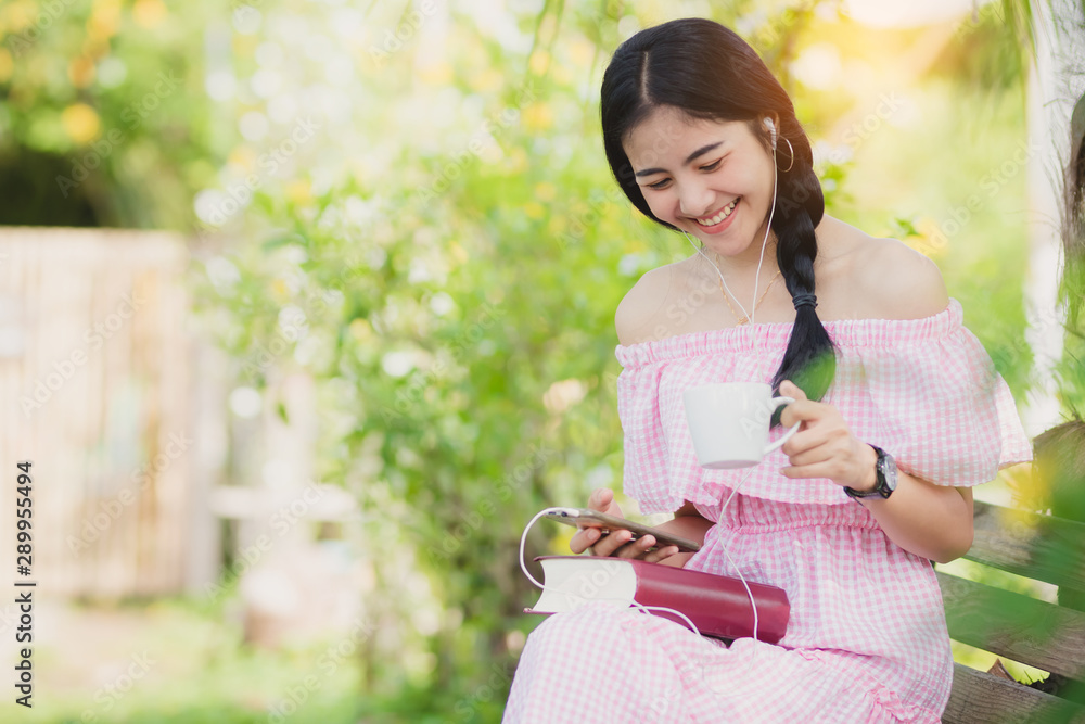 Asia woman using smartphone working playing with fun and happy in free time. Asia woman using smartphone working playing with fun and happy in free time.
