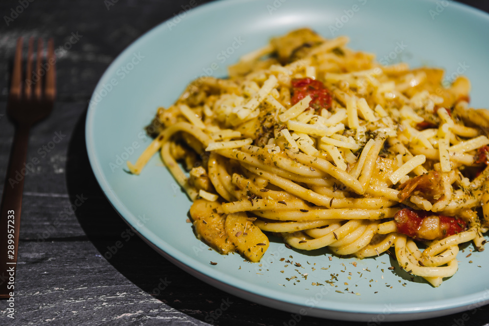 bucatini pasta with tomatoes and veggies and vegan cheese bucatini pasta with tomatoes and veggies and vegan cheese