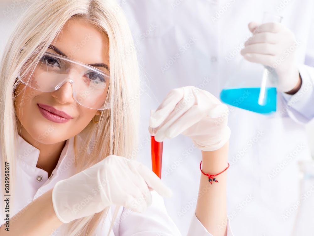 Young female woman doctor in hospital clinic lab Young female woman doctor in hospital clinic lab