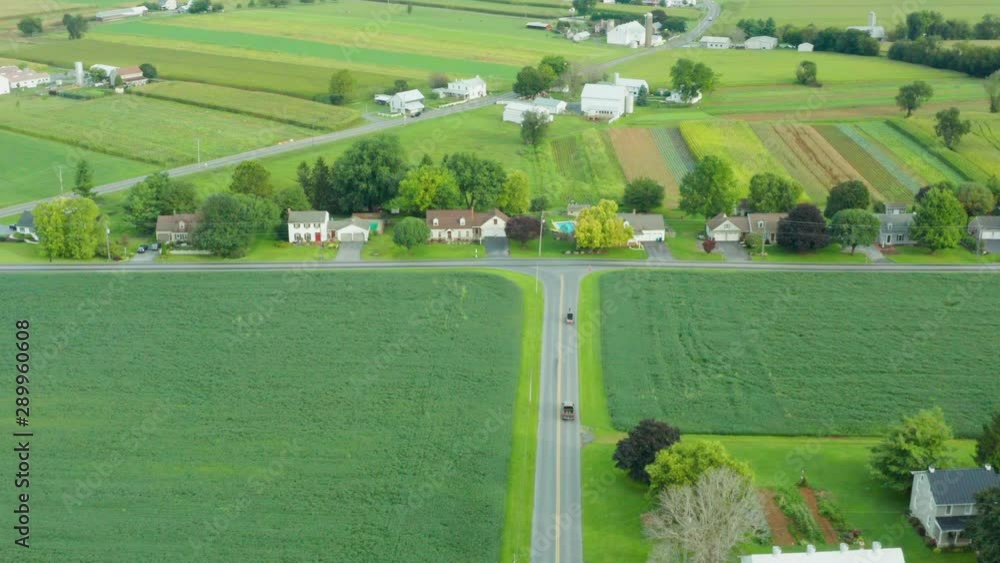 Aerial View of Rural Farmland In Pennsylvania with Amish Horse and Buggy Aerial View of Rural Farmland In Pennsylvania with Amish Horse and Buggy