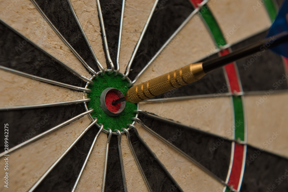 A dart hits the center of the darts board also known as A dart hits the center of the darts board also known as