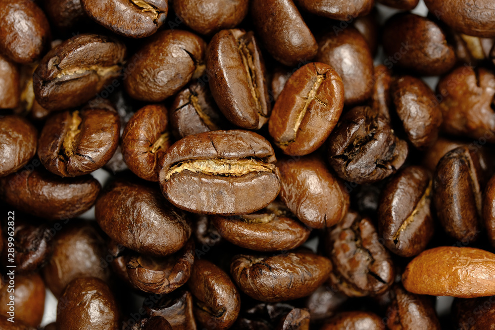 Roasted coffee beans background, Close Up mixture of different kinds of coffee beans. Roasted coffee beans background, Close Up mixture of different kinds of coffee beans.