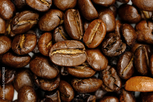 Roasted coffee beans background, Close Up mixture of different kinds of coffee beans.