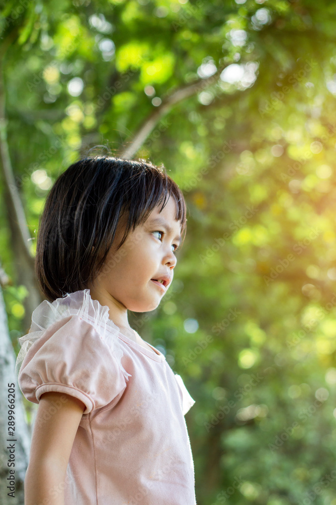 Portrait of Asian children girl in the park. Portrait of Asian children girl in the park.