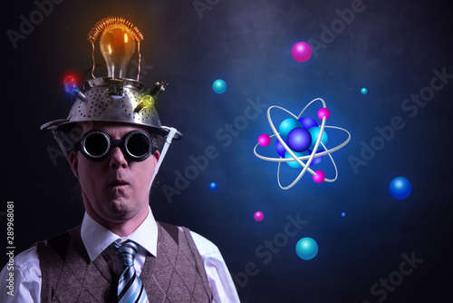 Nerd with tin foil hat presenting Atom icon