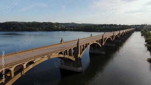 Wallpaper Mural Reverse aerial wide angle drone shot of traffic crossing bridge above Susquehanna River between Columbia and Wrightsville, Pennsylvania, USA Torontodigital.ca