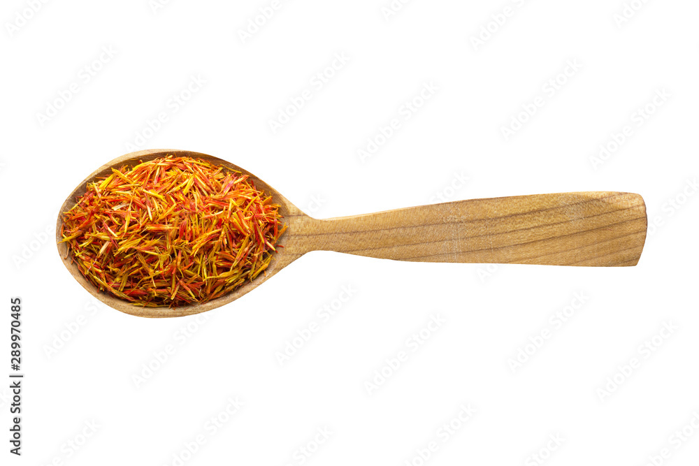 dried saffron in wooden spoon isolated on white background. spice for cooking food, top view. dried saffron in wooden spoon isolated on white background. spice for cooking food, top view.